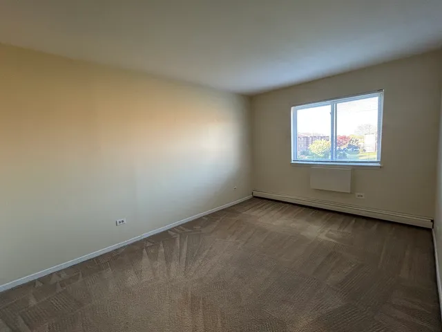 $1,595 | 1120 Copperfield Lane, Unit E, Schaumburg, IL 60193