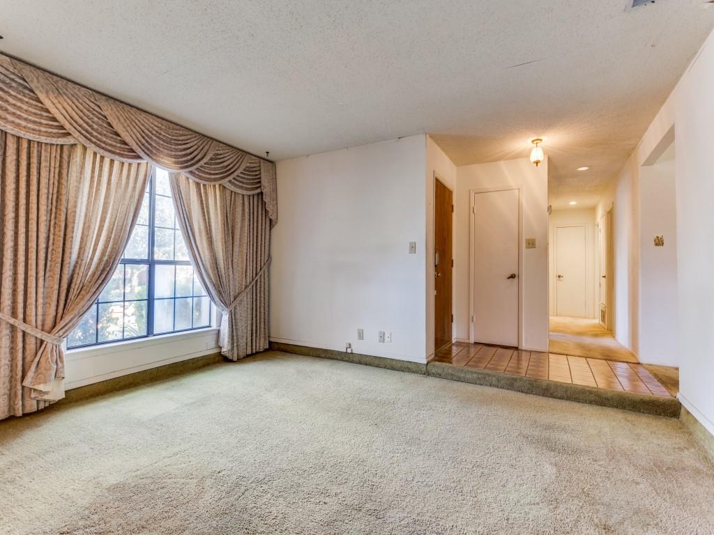 1807 Eldora Court Richardson, TX 75081 - Photo 2 of 23 an empty room with windows and closet