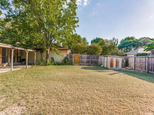 a house with trees in front of it