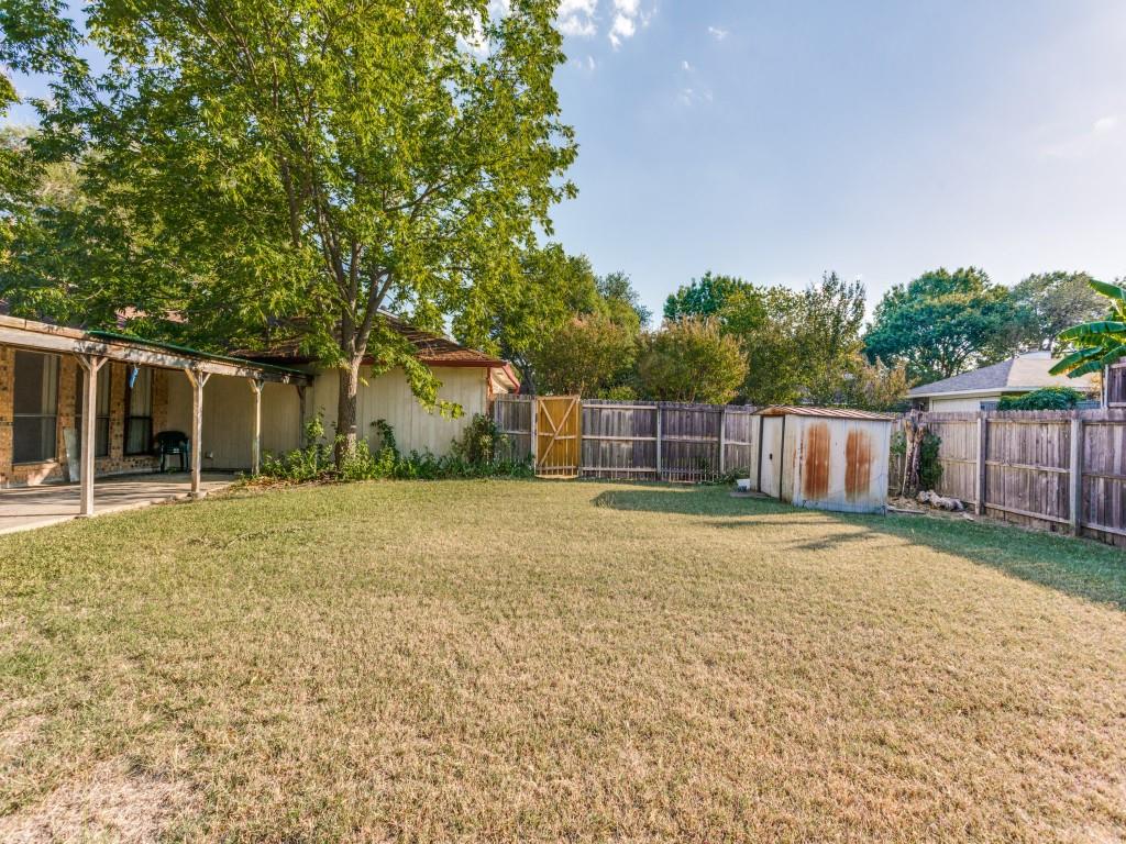 1807 Eldora Court Richardson, TX 75081 - Photo 22 of 23 a house with trees in front of it
