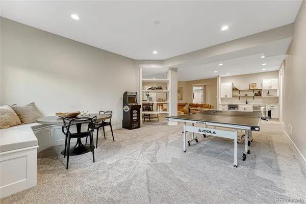 a kitchen with stainless steel appliances granite countertop a sink and cabinets
