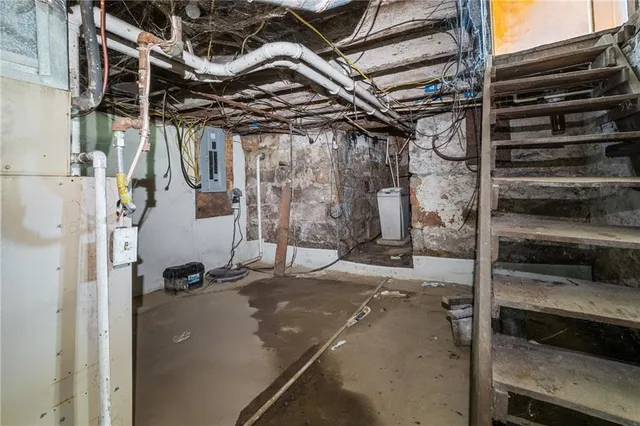 a view of a room with wooden walls