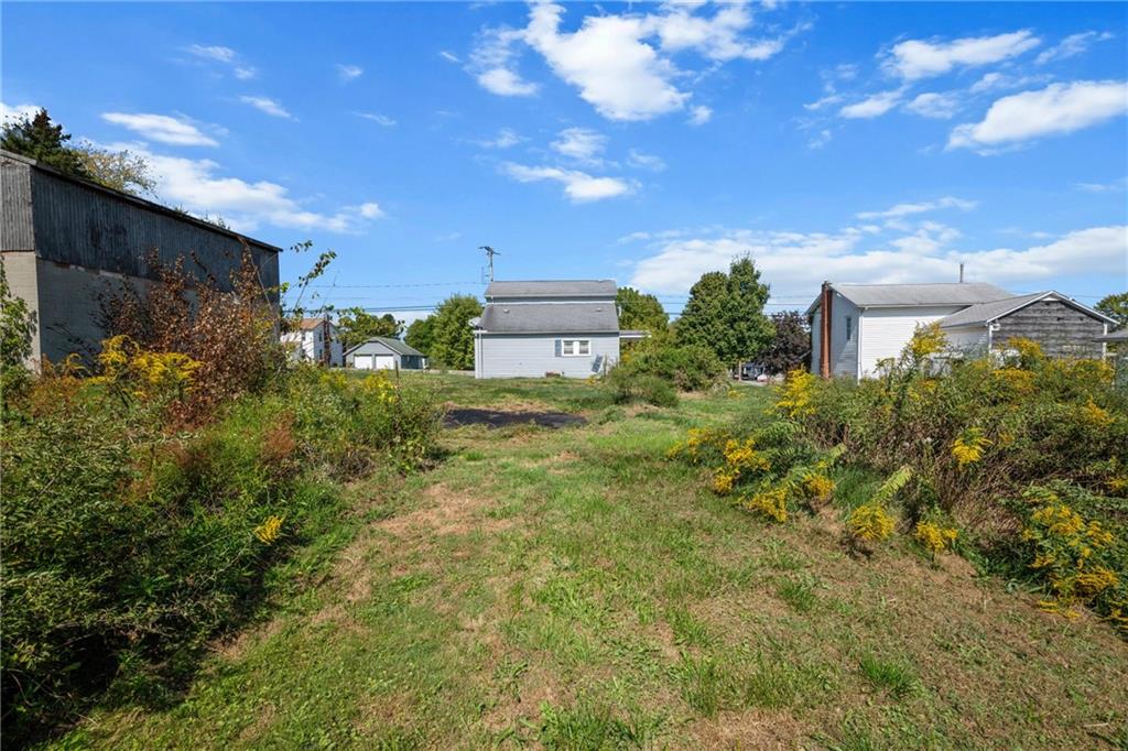 2019 Mercer West Middlesex Road Mercer, PA 16137 - Photo 16 of 17 a view of a big yard with potted plants and large tree