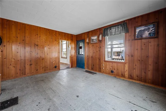 an empty room with windows