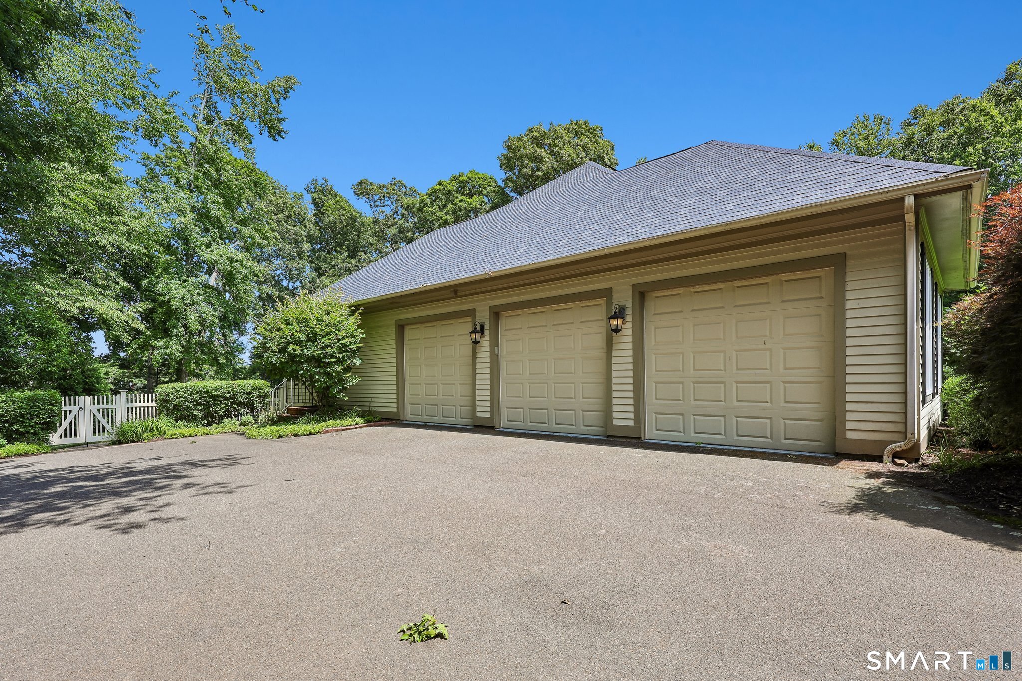 72 Strawberry Hill Road Madison, CT 06443 - Photo 34 of 40 The three car garage is great for cars and additional storage. The epoxy flooring in the garage is an added benefit