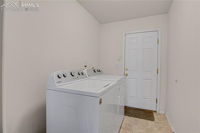 12237 Rio Secco Road Peyton, CO 80831 - Photo 27 of 45 Main floor laundry off of the garage