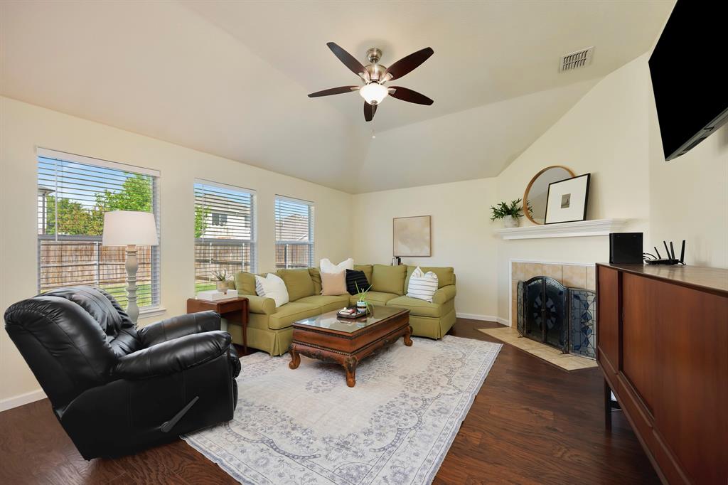 1333 Missionary Ridge Trail Fort Worth, TX 76131 - Photo 7 of 31 a living room with furniture and a fireplace