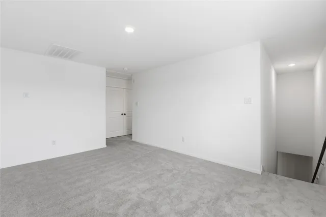 an empty room with an entryway