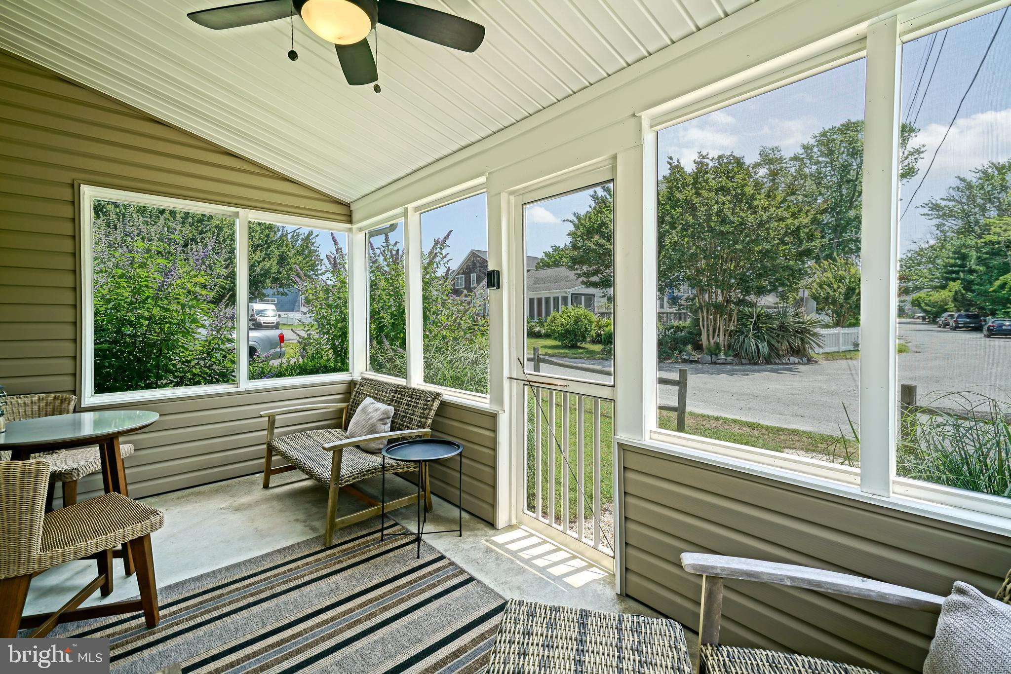 20594 Bay Road, Unit 9 Rehoboth Beach, DE 19971 - Photo 4 of 41 Front Screened Porch