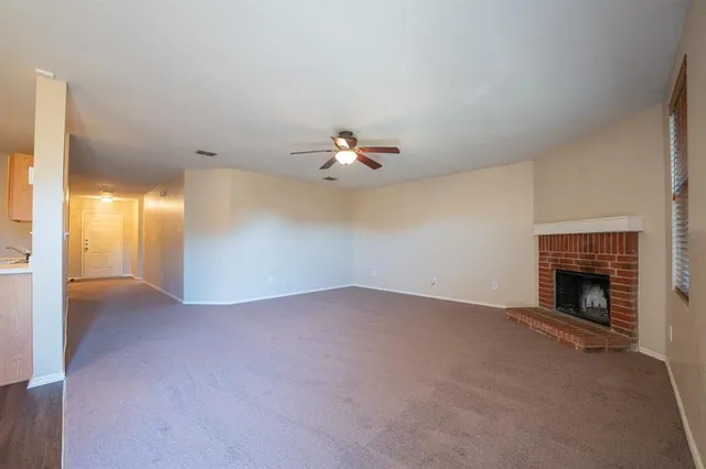 a view of a livingroom with a fireplace