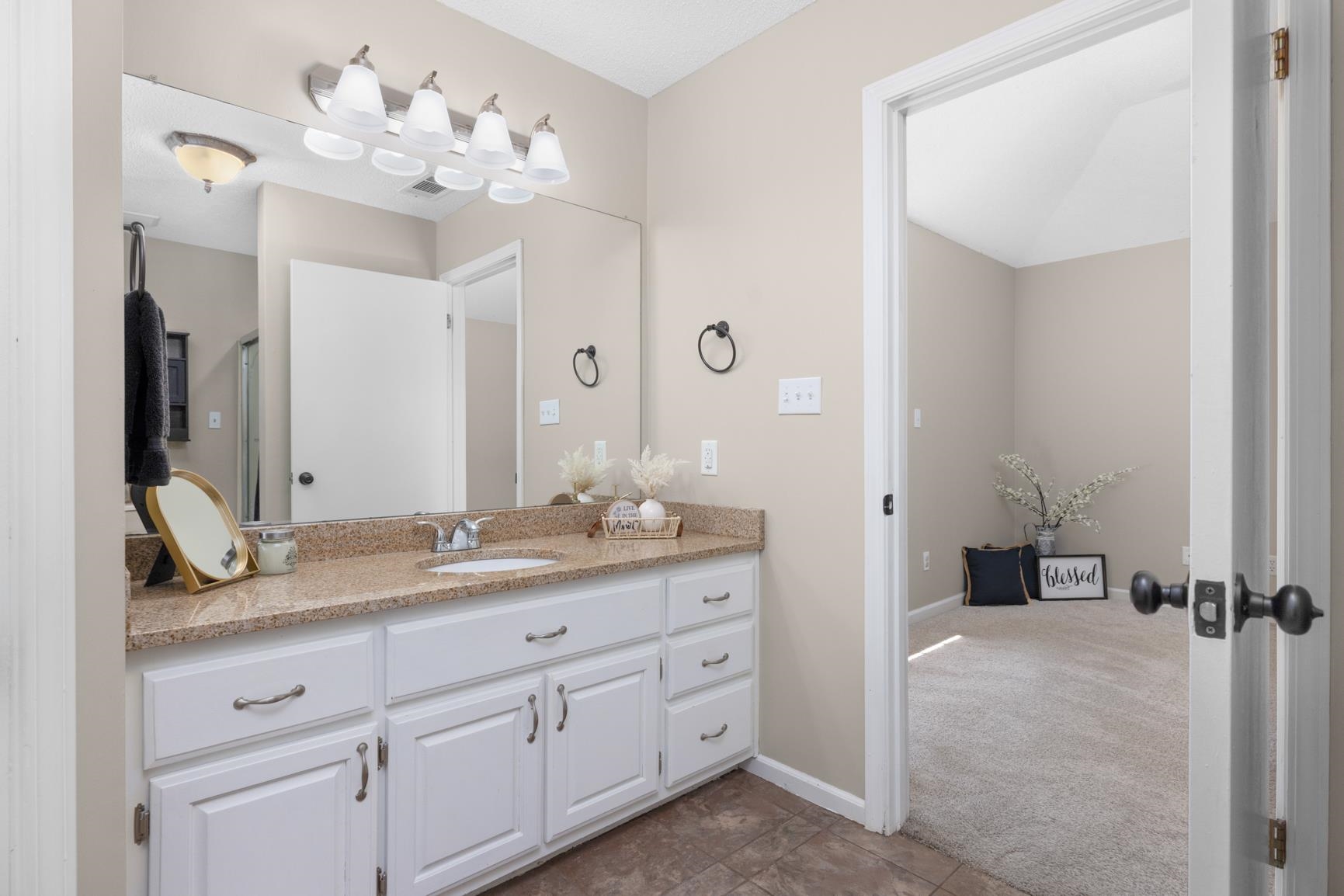 284 Pwr Loop Munford, TN 38058 - Photo 20 of 36 Bathroom featuring dark colored carpet and vanity