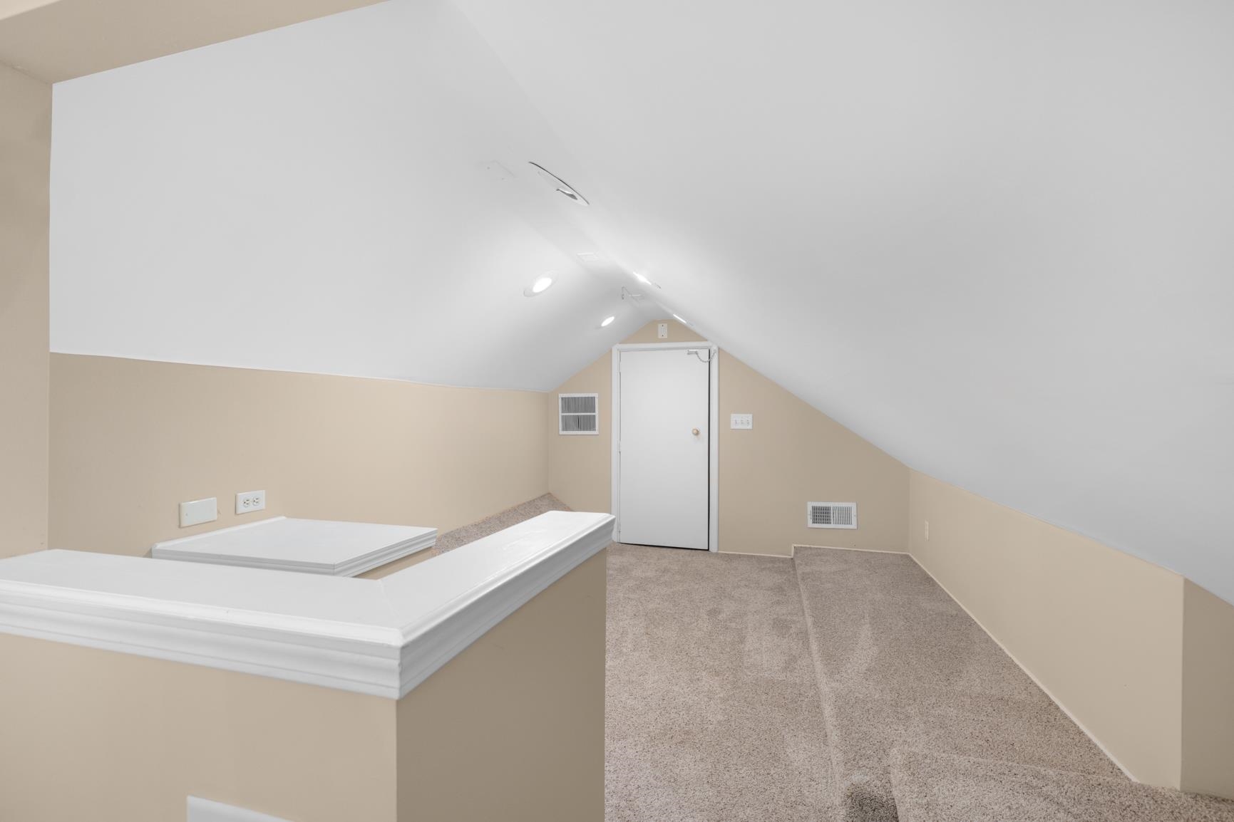 284 Pwr Loop Munford, TN 38058 - Photo 29 of 36 Bonus room featuring light colored carpet and vaulted ceiling