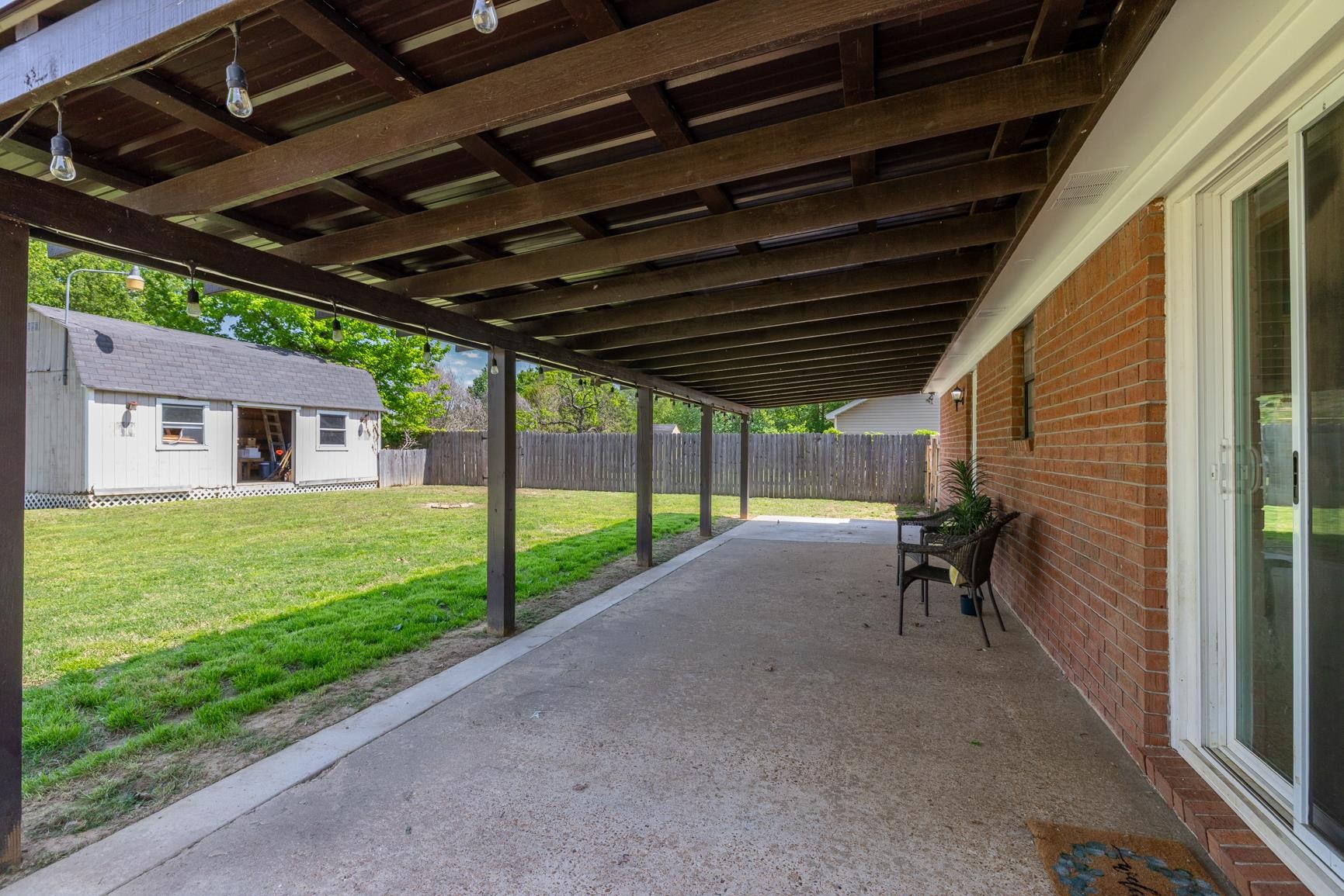 284 Pwr Loop Munford, TN 38058 - Photo 30 of 36 View of patio / terrace featuring an outdoor structure