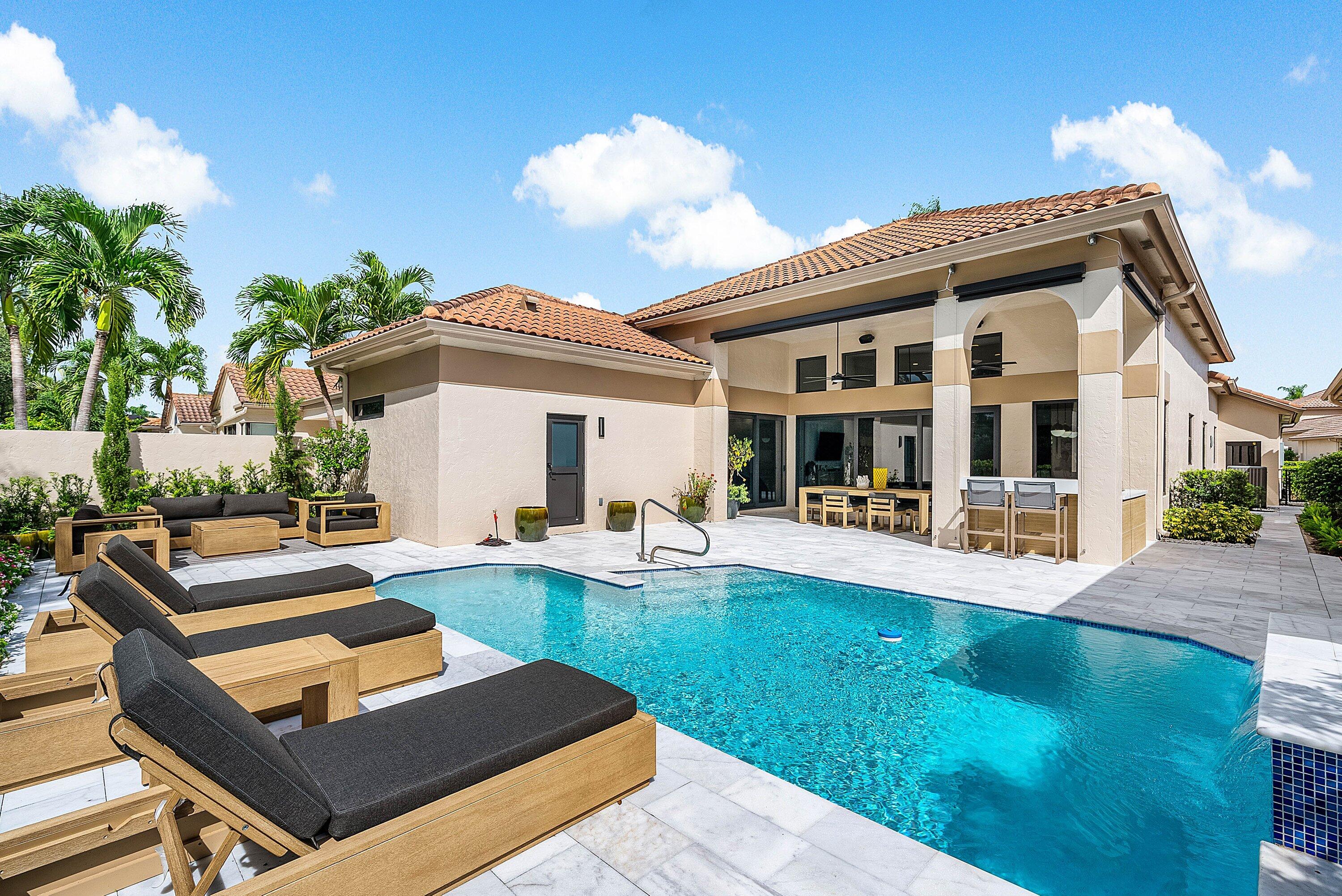 2370 Northwest 53rd Street Boca Raton, FL 33496 - Photo 35 of 42 Rear elevation/ Pool