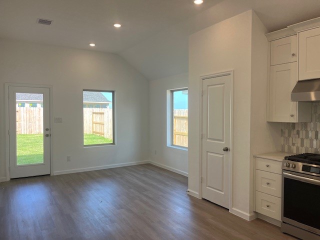 2139 Mosaic Vly Court Angleton, TX 77515 - Photo 8 of 14 a view of a kitchen with a sink a refrigerator and window