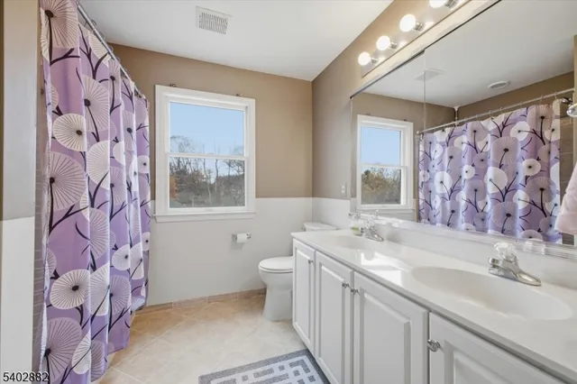 $869,999 | 13 Old Schoolhouse Road, Asbury, NJ 08802