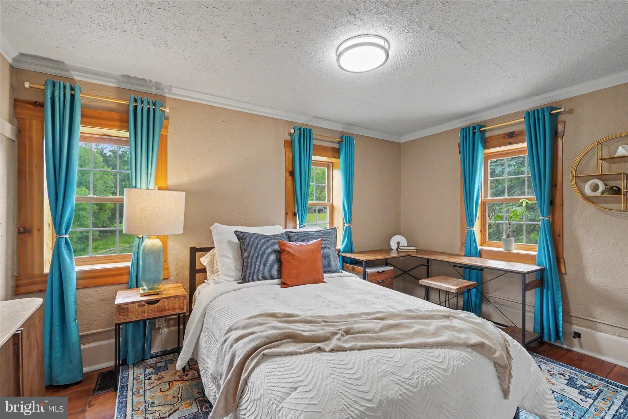 4941 Walters Hatchery Road Spring Grove, PA 17362 - Photo 62 of 71 a bedroom with bed and large windows