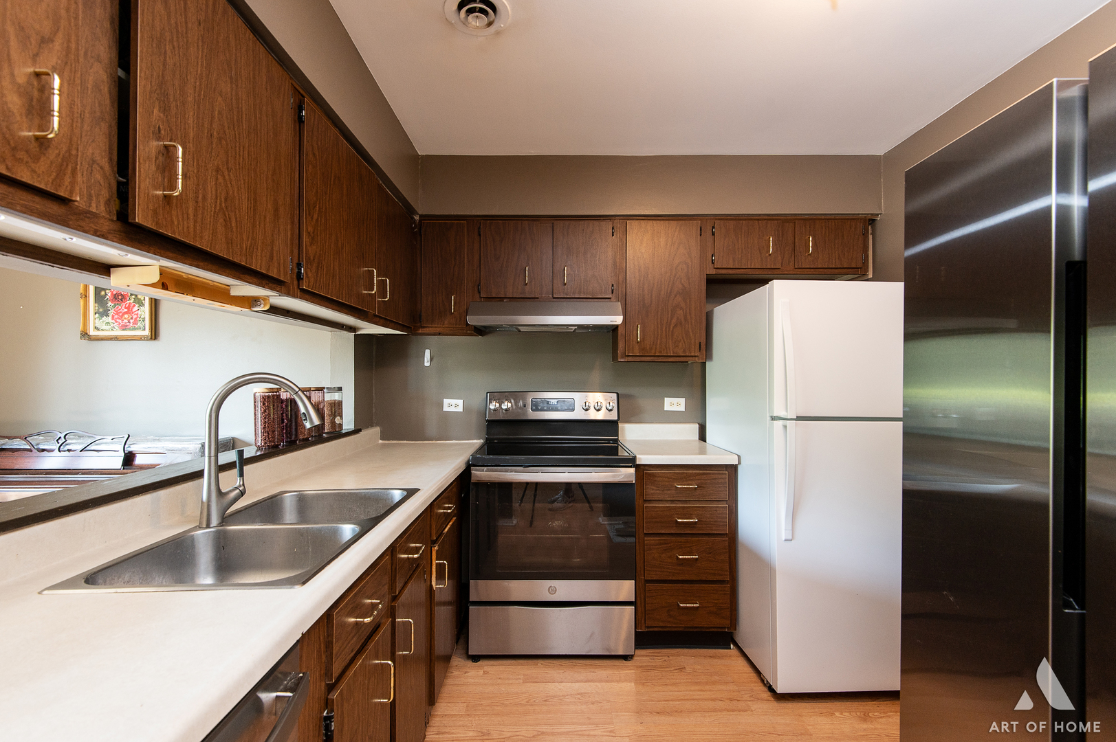 835 Waterview Circle, Unit 2 Vernon Hills, IL 60061 - Photo 11 of 30 a kitchen with a refrigerator sink and stove