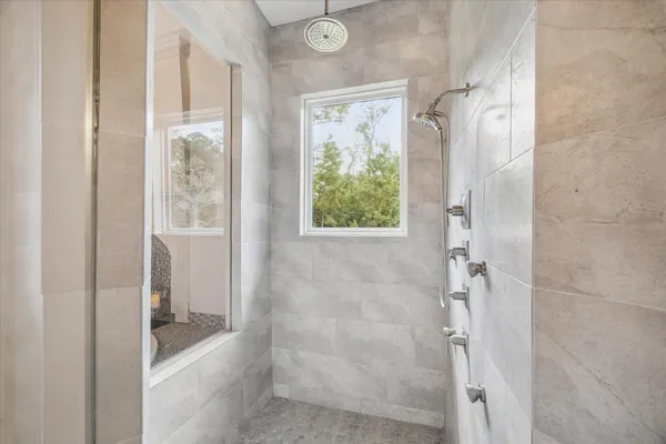 a bathroom with a sink a vanity and mirror