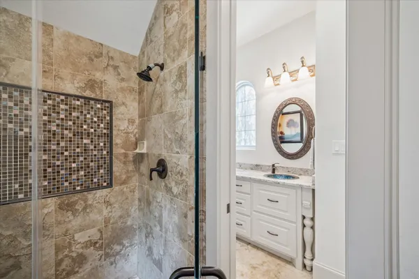 a kitchen with a sink and cabinets