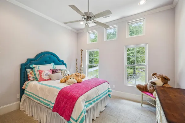 a kitchen with a sink appliances and cabinets