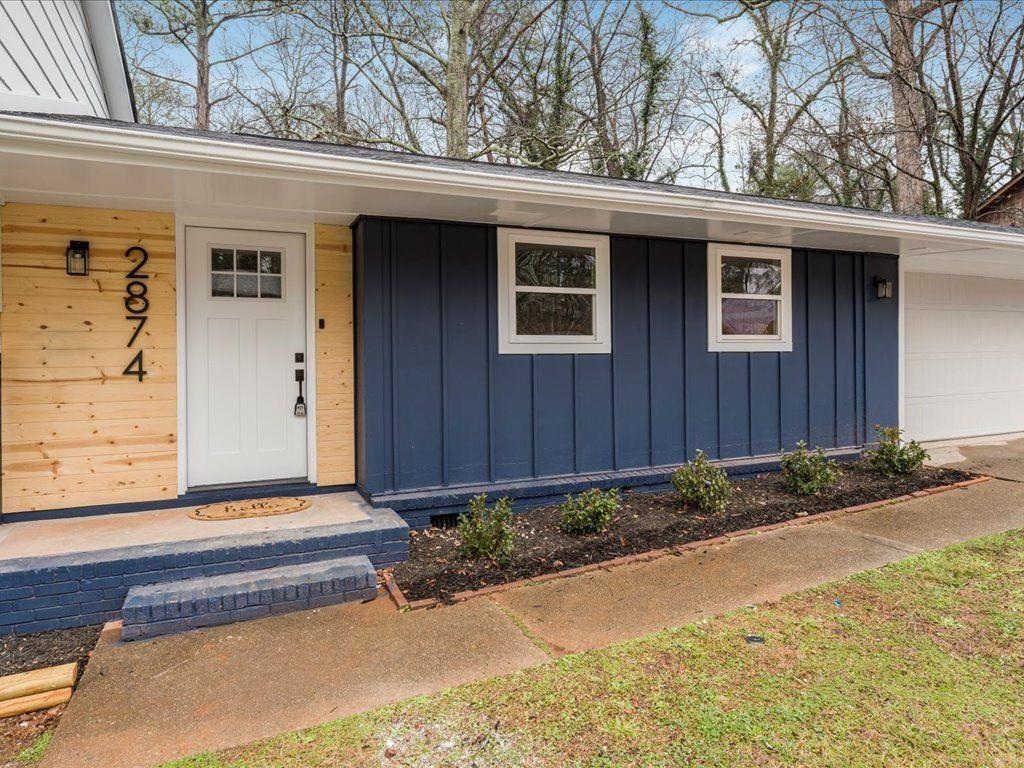 2874 Cocklebur Cove Court Decatur, GA 30034 - Photo 2 of 36 a front view of a house having yard