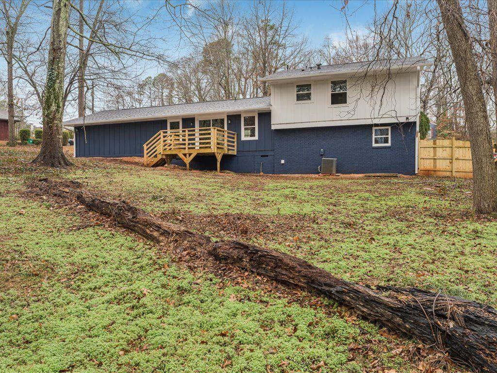 2874 Cocklebur Cove Court Decatur, GA 30034 - Photo 33 of 36 a front view of a house with a yard