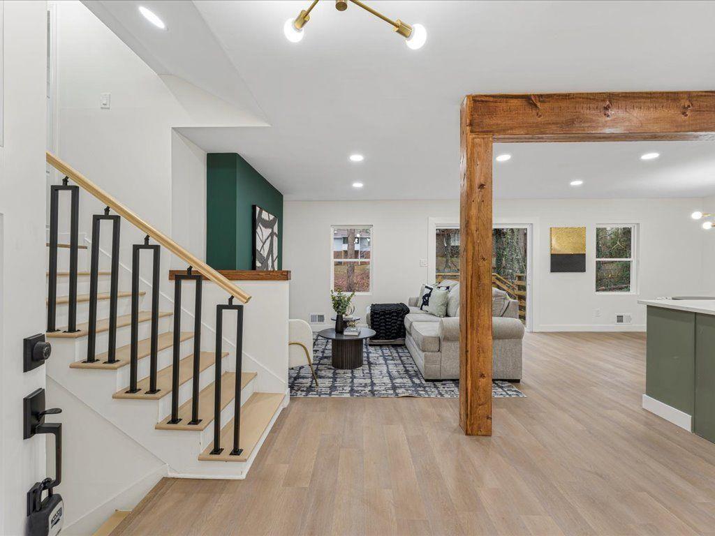 2874 Cocklebur Cove Court Decatur, GA 30034 - Photo 4 of 36 an entryway with wooden floor and livingroom view