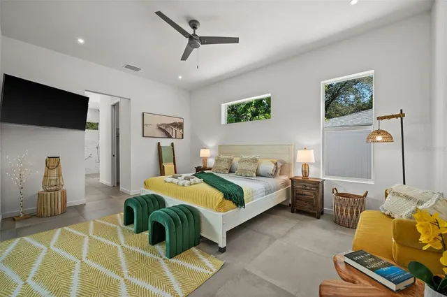 a bedroom with a bed and furniture