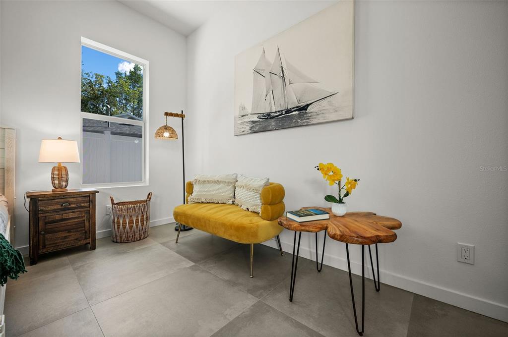 2375 Waldemere Street Sarasota, FL 34239 - Photo 18 of 36 a living room with furniture and wooden floor