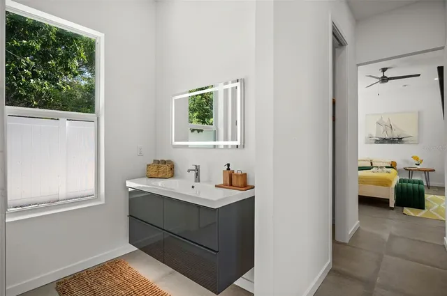 a room that has a bed and a window