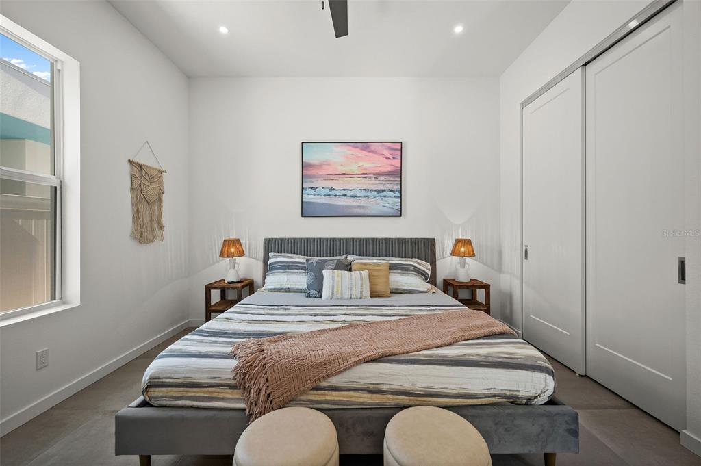 2375 Waldemere Street Sarasota, FL 34239 - Photo 20 of 36 a bedroom with bed and a painting on the wall