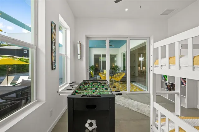 a room with counter top and outdoor seating