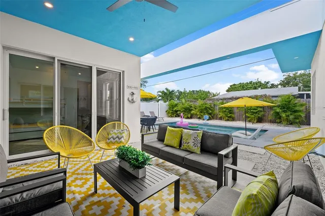 a outdoor living space with furniture and a potted plant