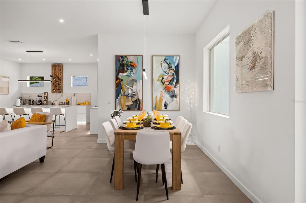 2375 Waldemere Street Sarasota, FL 34239 - Photo 4 of 36 a dining room with furniture and window