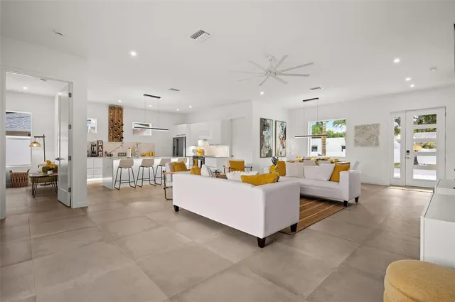 a living room with furniture and a view of living room