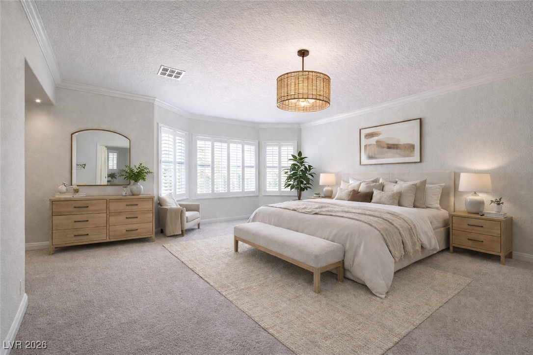 2515 Finlarig Street Henderson, NV 89044 - Photo 7 of 11 Carpeted bedroom with ornamental molding, a textured ceiling, and a textured wall