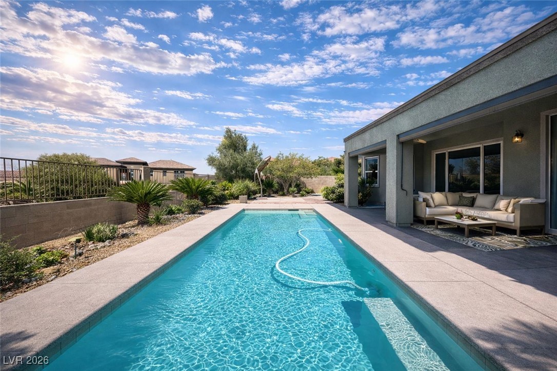 2515 Finlarig Street Henderson, NV 89044 - Photo 10 of 11 View of pool with a fenced backyard, a patio area, and outdoor lounge area
