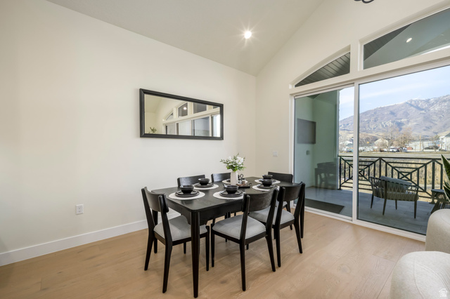 250 South Main Street, Unit 25 Alpine, UT 84004 - Photo 9 of 31 Dining area featuring light wood-type flooring, recessed lighting, and vaulted ceiling