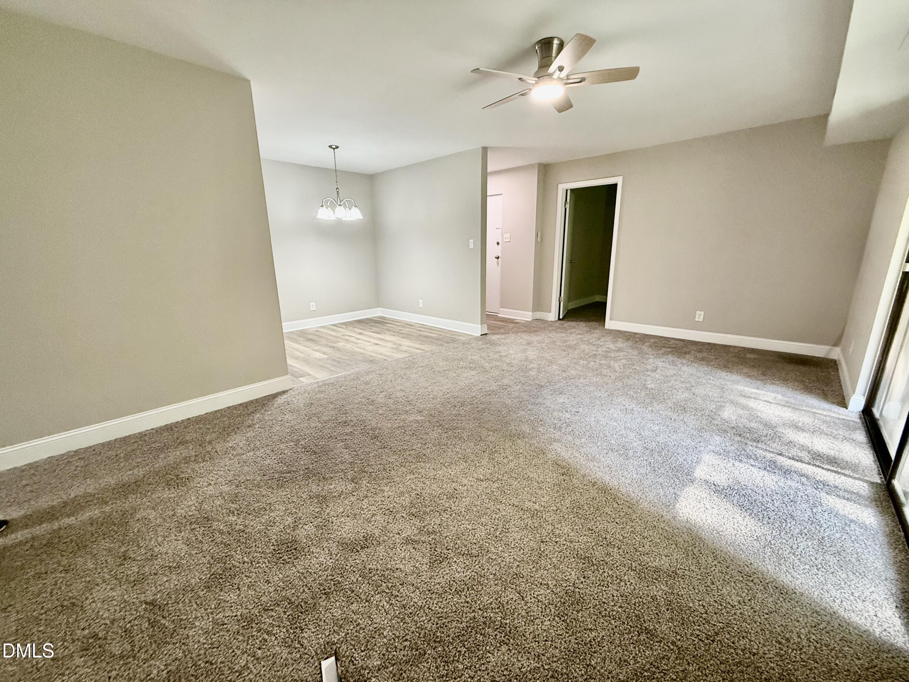 1114 Schaub Drive, Unit I Raleigh, NC 27606 - Photo 3 of 9 an empty room with a bathroom