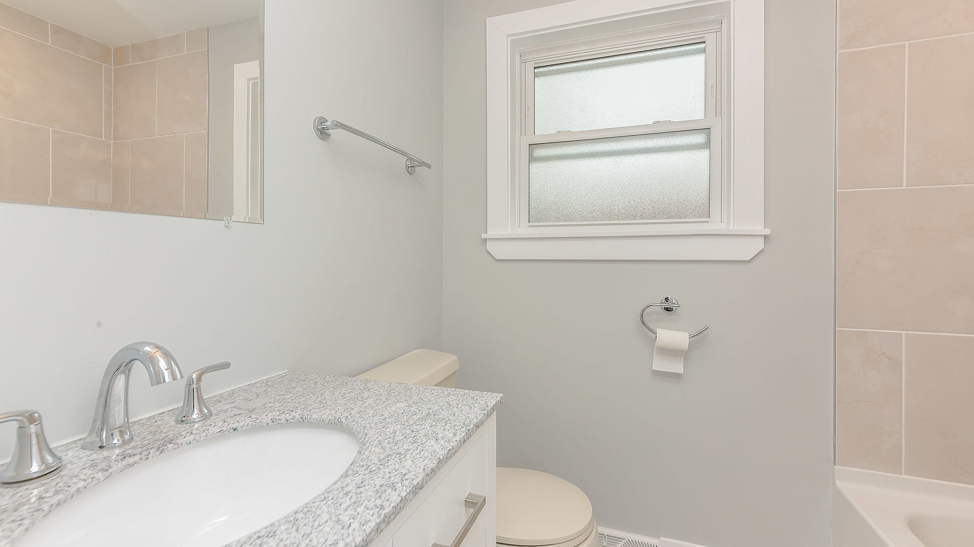 1159 West 112th Street Chicago, IL 60643 - Photo 16 of 27 a bathroom with a granite countertop toilet a sink and mirror