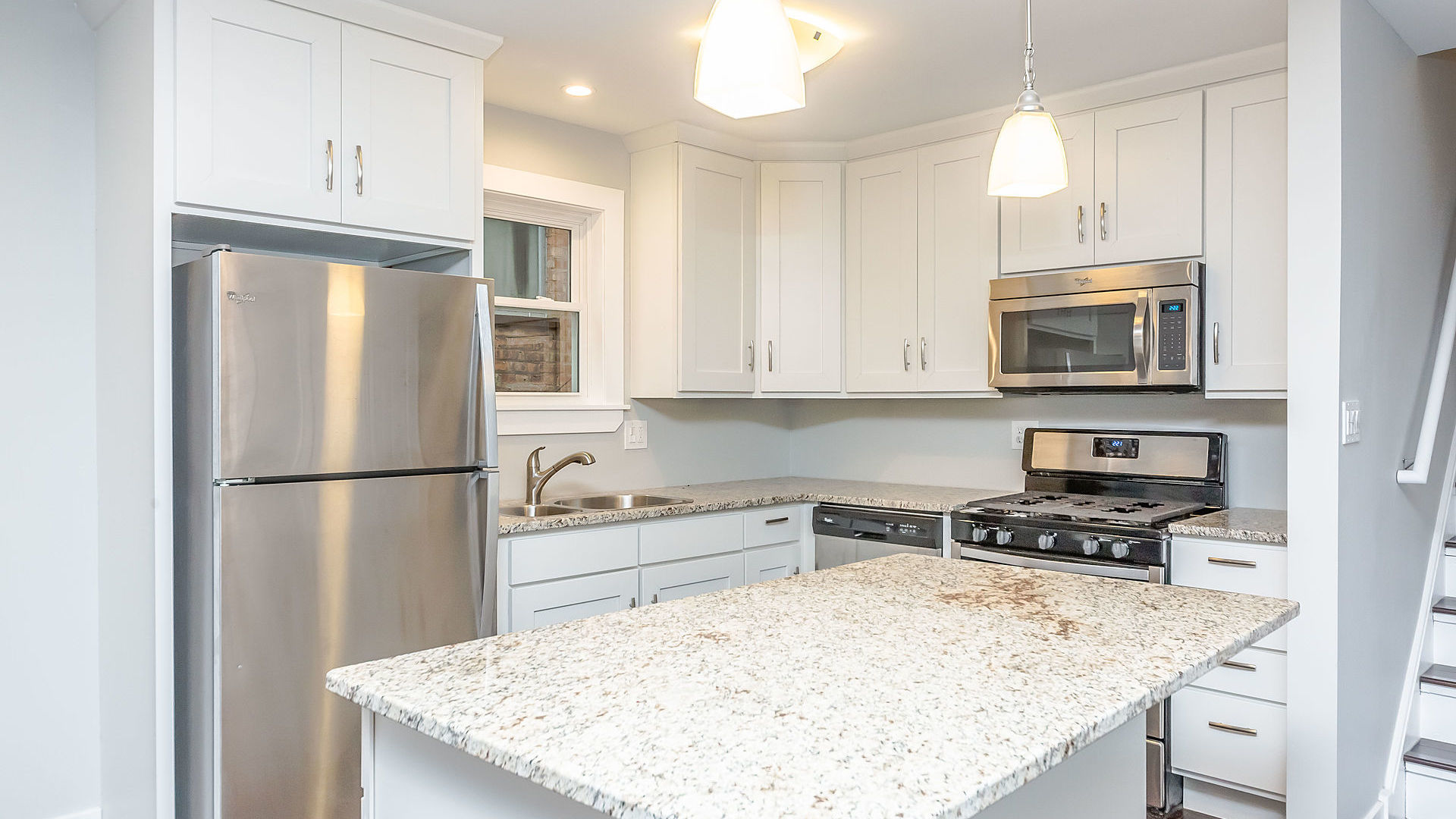1159 West 112th Street Chicago, IL 60643 - Photo 7 of 27 a kitchen with a refrigerator a microwave and stove