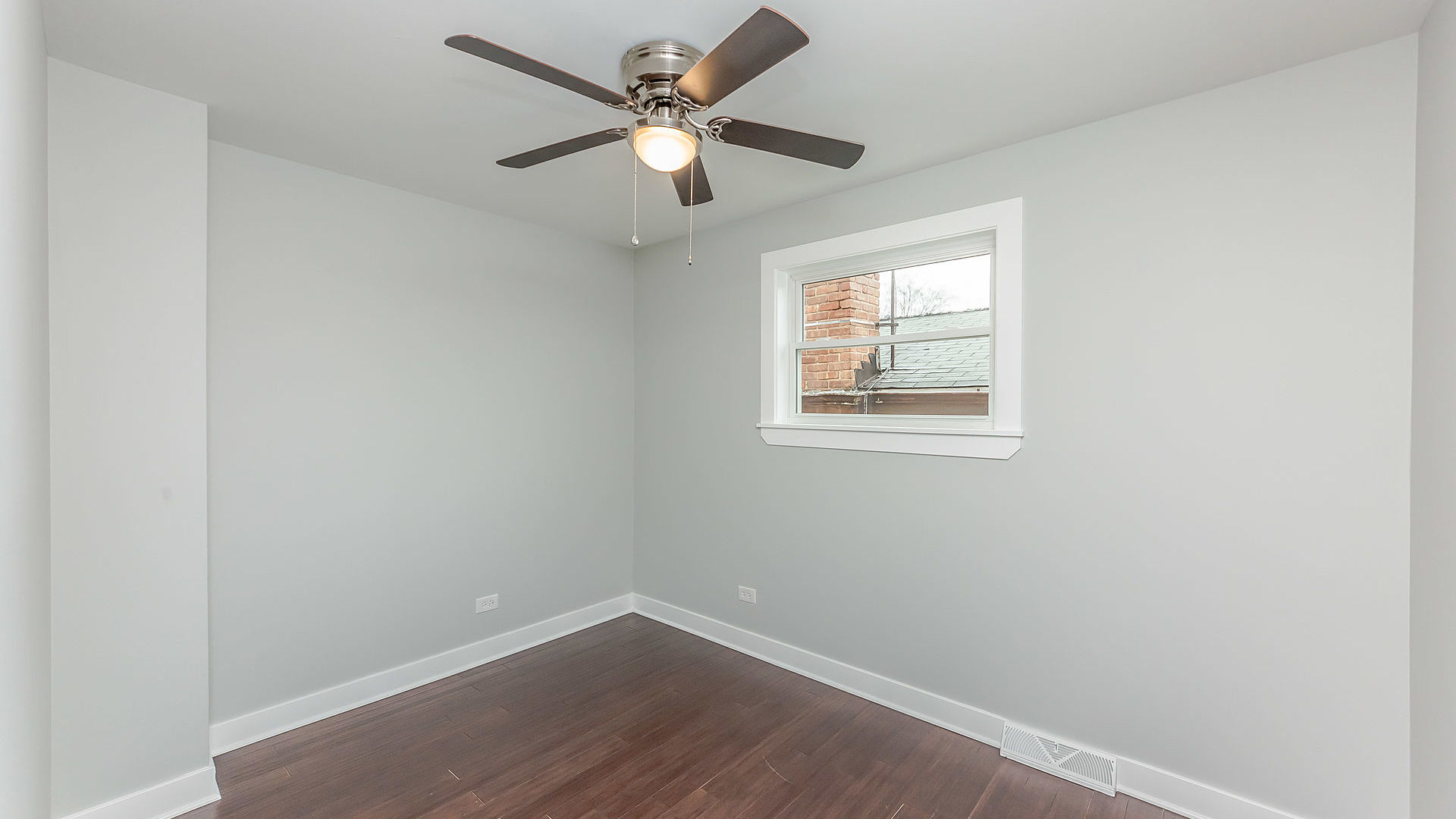 1159 West 112th Street Chicago, IL 60643 - Photo 10 of 27 an empty room with a window and a fan