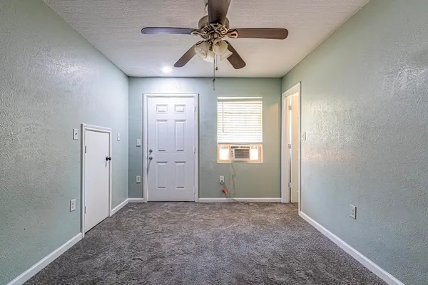 a view of a window in an empty room