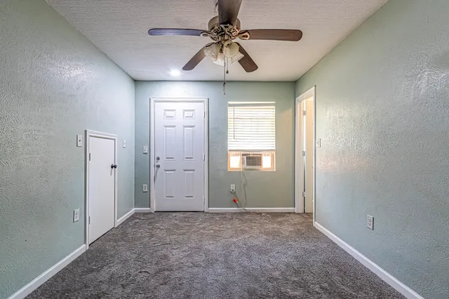 a view of a window in an empty room
