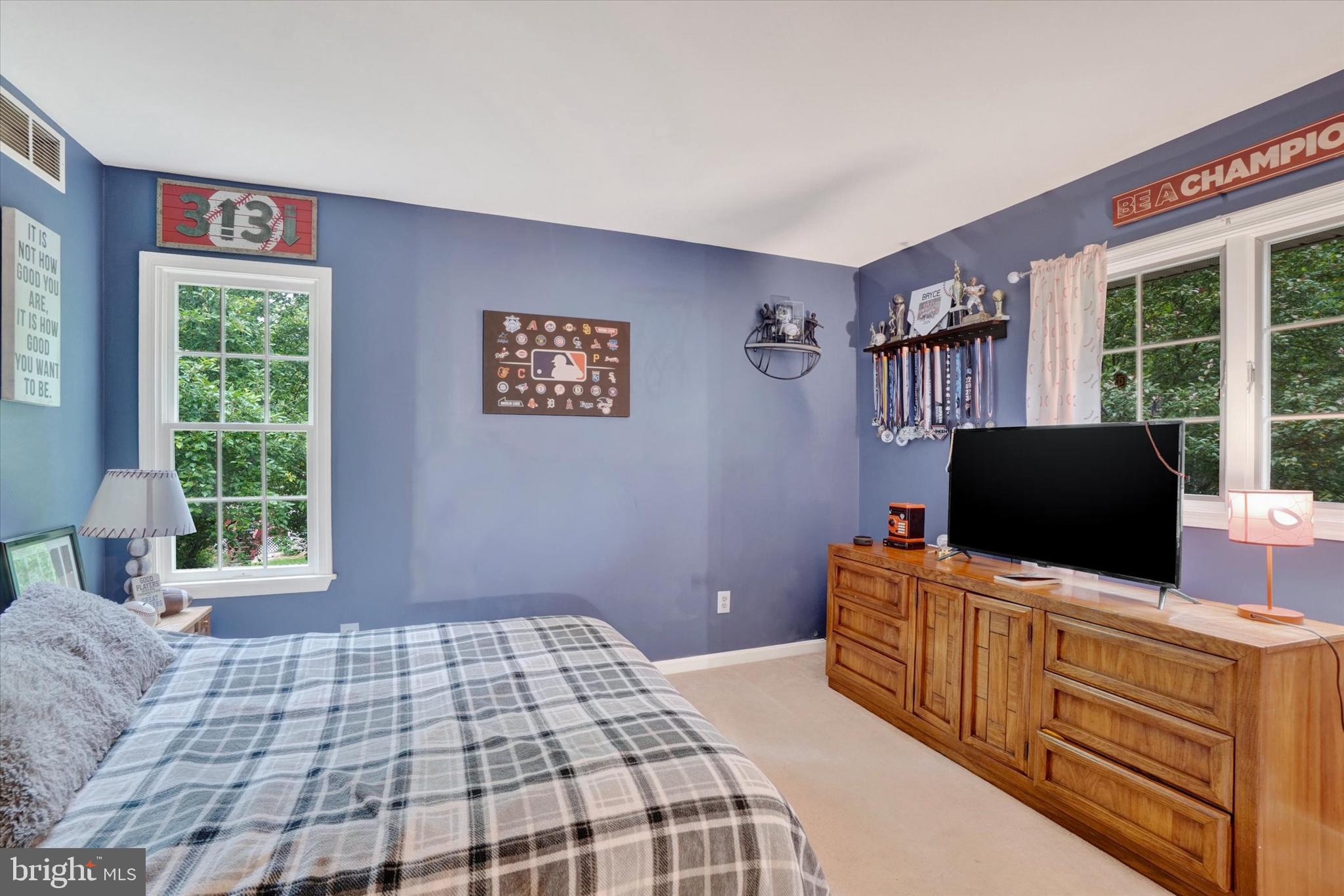 5677 Woods Road Stewartstown, PA 17363 - Photo 13 of 26 a bedroom with furniture and windows