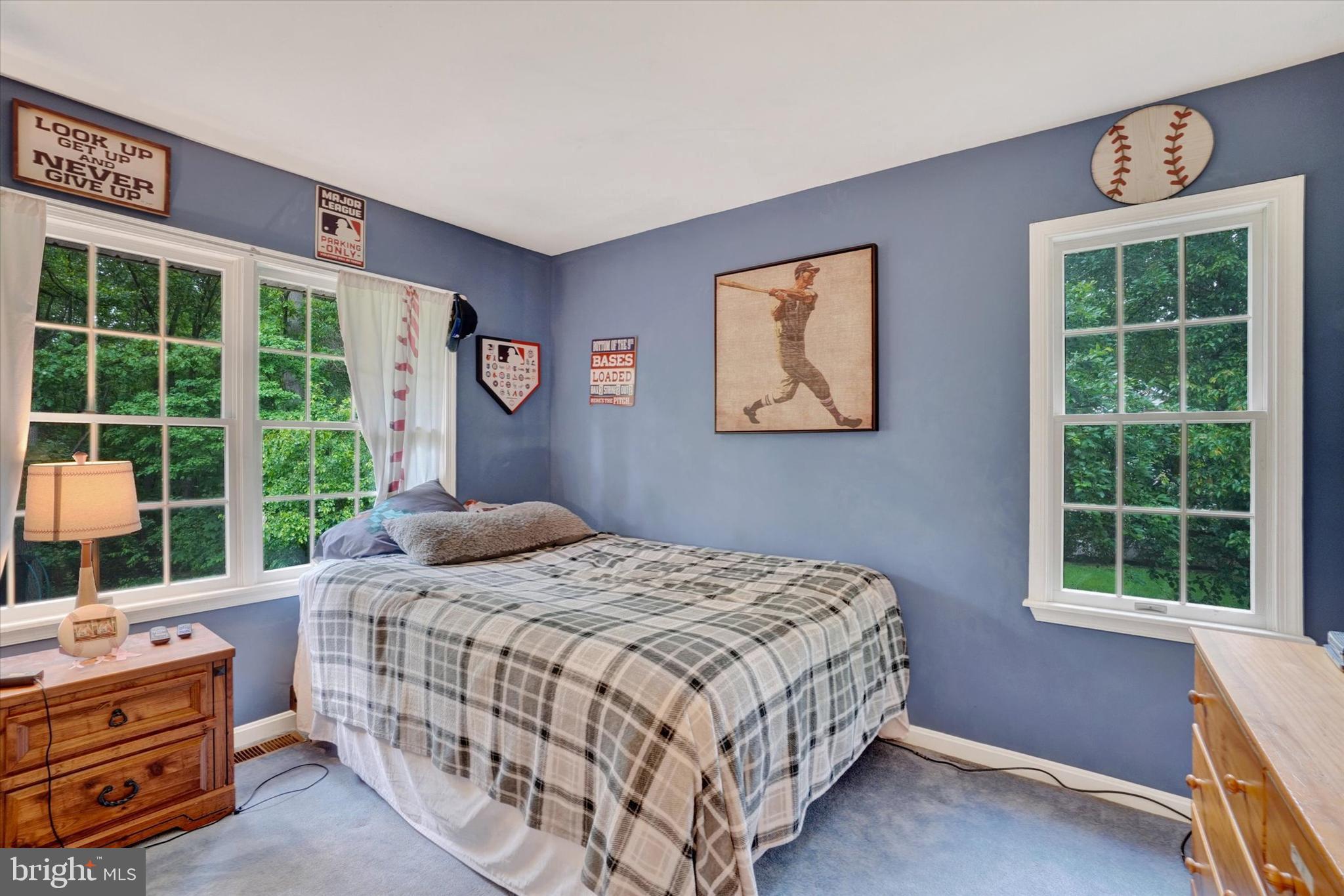 5677 Woods Road Stewartstown, PA 17363 - Photo 14 of 26 a bedroom with a bed and a window