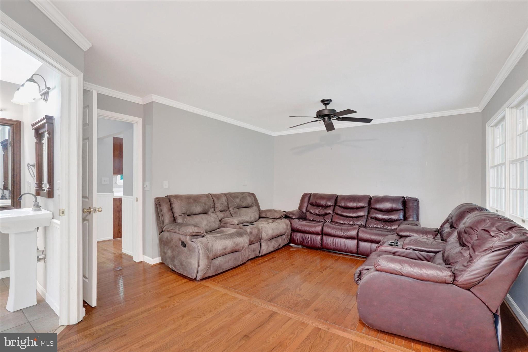 5677 Woods Road Stewartstown, PA 17363 - Photo 20 of 26 a living room with furniture and a couch