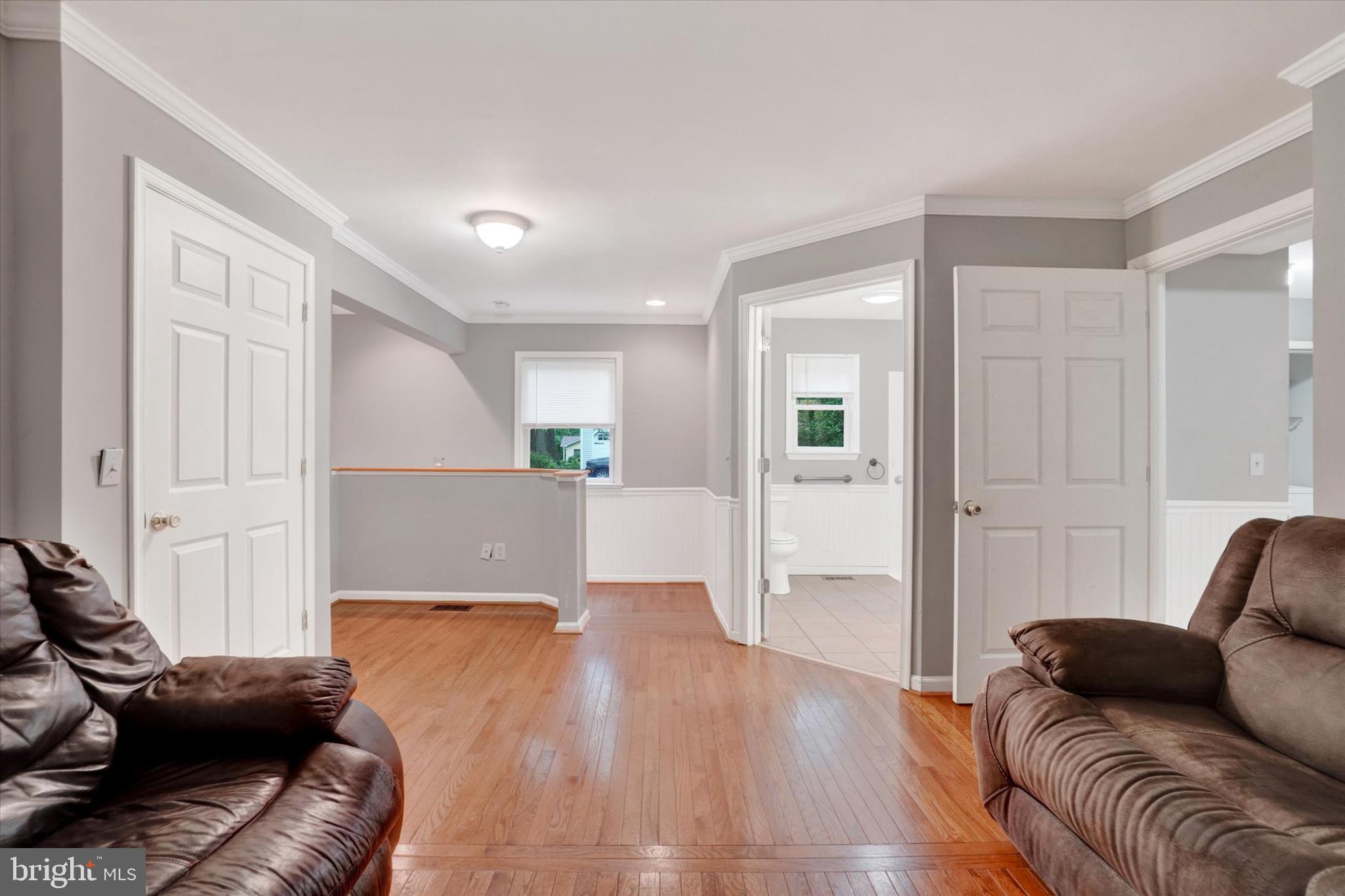 5677 Woods Road Stewartstown, PA 17363 - Photo 21 of 26 a living room with furniture and a couch