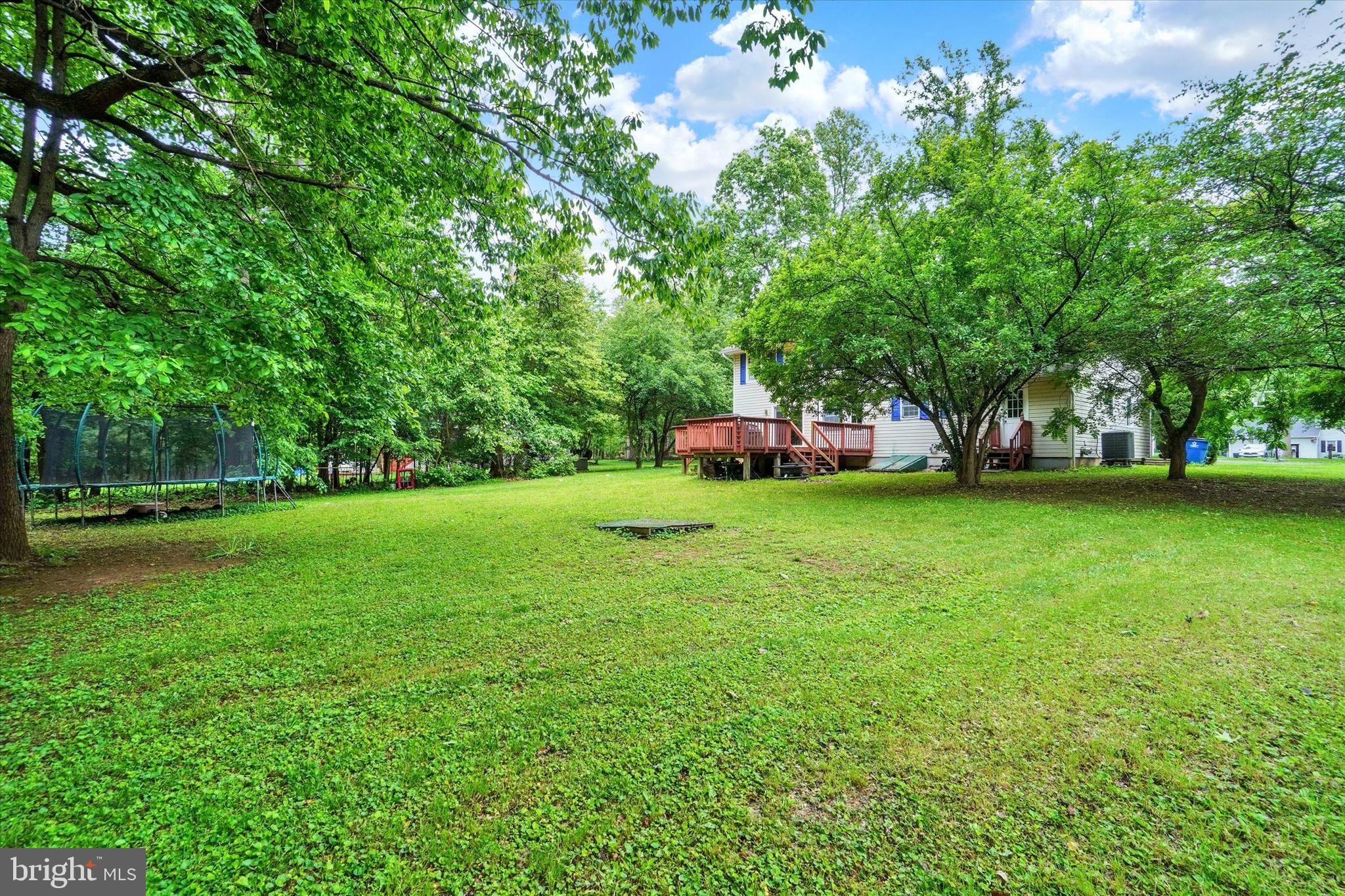 5677 Woods Road Stewartstown, PA 17363 - Photo 25 of 26 a view of green field with trees in the background